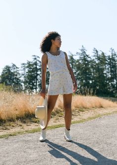 When only the most adorable will do: the Cowboy Dreams Shorts. Tiny blue cowboys dance across this soft cream cotton knit, trimmed with a ruffle hem and finished with a soft elastic waistband. Though inspired by vintage pyjamas, we're sure this style would love to be worn out of the house with the matching cami, or Cactus Clover Tee. Features Roomy pockets Fully elastic waistband Ruffle trim Decorative bow 100% vintage cotton, deadstock sourced Machine wash cold, hang to dry. Size chart - Sized for a relaxed lounge fit. If you are in between sizes, you can size down for a more fitted look. A note from the designer: Storytime. We were originally only going to include the camisole in this collection. But in the eleventh hour (aka - right before our photoshoot) we just couldn't resist whippin