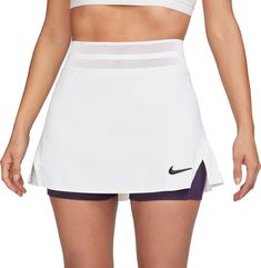 Elevate your game in this stretchy, easy-fitting tennis skirt. Lightweight, sweat-wicking fabric helps keep you covered but cool—even as your game heats up. Plus, drop-in pockets on the internal shorts let you keep your essentials close. Fit & Design: Stretchy and easy-fitting Lightweight, sweat-wicking fabric helps keep you covered and cool Inner shorts let you tuck spare balls under the hem for convenient storage Mesh elastic waistband offers both snug hold and breathability Technology: Nike Dri-FIT technology moves sweat away from your skin for quicker evaporation, helping you stay dry and comfortable. Additional Details: Machine wash Sports Mini Skort In Elastane, Fitted Workout Skirt With Go-dry Technology, Athleisure Stretch Tennis Skort, Fitted Tennis Activewear With Built-in Shorts, Elastane Mini Tennis Skirt For Sports, Stretch Lined Tennis Skirt For Sports, Mini Elastane Tennis Skirt For Sports, Sporty Fitted Mini Tennis Skirt, Fitted Activewear Mini Skirt For Sports