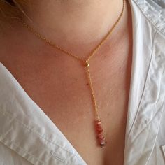 "Minimalist, wearable and delicate 14k gold filled necklace with raw rhodochrosite beads. Length: available from 14\" (35cm) to 24\" (61cm). Width raw chip beads: 3-5mm raw rhodochrosite chip beads. Width 14k gold filled chain: 1,66 mm. Materials: strong 14k gold filled lobster clasp. Handmade in Spain. ✩ Please kindly note that these raw stones are natural and irregulars so they can vary slightly in color and shape from the one on the pics. They can also contain some inclusions. ✩ Ideal for a g Gold Pink Opal Necklace For Gifting, Gold Pink Opal Necklace For Gift, Adjustable 14k Gold-filled Rose Gold Necklace, Dainty Pink Charm Necklace With Delicate Chain, Dainty Pink Jewelry With Delicate Chain, Dainty Crystal Necklace With Adjustable Chain For Healing, Dainty Gold Pink Opal Jewelry, Dainty Pink Opal Gemstone Jewelry, Dainty Pink Opal Gold Jewelry