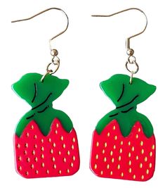 Step back in time with Grandma’s Strawberry Purse Candy Earrings, a delightful nod to vintage charm. These super lightweight earrings measure 2 1/2 inches from the top of the hook to the bottom, making them the perfect accessory for any nostalgic fashionista. Featuring stainless steel hooks coated in 18k gold and compl Retro Drop Earrings Jewelry Gift, Retro Dangle Jewelry As Gift, Retro Dangle Jewelry As A Gift, Retro Dangle Earrings For Pierced Ears, Retro Dangle Earrings For Gift, Retro Handmade Drop Earrings, Retro Ear Wire Earrings, Vintage Earrings With French Hook For Gift, Retro Dangle Earrings Gift