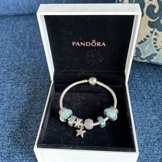 Pandora Beach Theme Bracelet, 7 Inches In Size Also Comes With Box And The 9 Charms. 2 Starfish Charms In The Center, Turquoise ,Blue And Silver Just Like New Pandora Beach, Bracelet Ocean, Jewelry Pandora, Sea Theme, Ocean Theme, Pandora Charm, Ocean Themes, Beach Theme, Pandora Bracelet