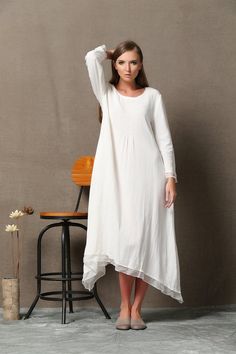 Cool and comfortable for hot summer days, this natural linen and white lagenlook dress is elegant and stylish. It is a wonderful wardrobe staple that's a timeless classic you'll wear again and again. Welcome to my shop and thanks for your interested to the white linen dress. this is a loose White Lagenlook Dress,The White Lagenlook Dress has a litter see through, but most customer said it can accept. if you want a lining, you can contact us, we can add a white cotton lining for you. the tiny fol White Bohemian Linen Dress Made Of Ramie, White Bohemian Ramie Linen Dress, Long Sleeve Ramie Summer Dresses, Elegant White Linen Dress With Relaxed Fit, Lagenlook Linen Dress With Asymmetrical Hem, Elegant White Relaxed Fit Linen Dress, Summer Linen Lagenlook Dress With Asymmetrical Hem, Spring Beach Linen Dress With Asymmetrical Hem, Spring Linen Dress With Asymmetrical Hem