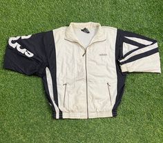 Vintage Adidas Jacket Good Vintage Condition Made in Taiwan Each Vintage item is unique and fits differently. Please refer to measurements for the best fit.  Size Small  Width 23 in  Length 26 in * I ship all items in two or three business days and utilize Priority Mail options via USPS. Expedited shipping is available upon request. If you have any questions; Please Ask! *I Ship International!! PLEASE EMAIL BEFORE PURCHASING INTERNATIONALLY * All of my items are pre-owned and, unfortunately, som Adidas Vintage Jacket, Adidas Aesthetic, Light Rain Jacket, Adidas Windbreaker, Adidas Vintage, Les Sports, Light Rain, All Sports, Vintage Adidas