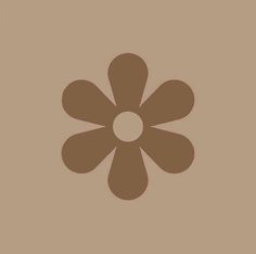 a brown flower on a tan background