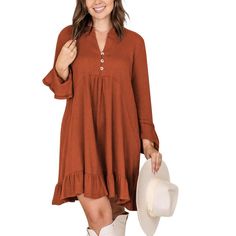 The dress is adorned with a lovely ruffle edge detail, giving it a feminine and playful appeal. Casual Long Sleeve Ruffle Dress For Fall, Casual Ruffle Sleeve Mini Dress For Fall, Flowy Ruffle Sleeve Dresses For Fall, Flowy Dress With Ruffle Sleeves For Fall, Casual Mini Dress With Ruffle Sleeves For Fall, Fall V-neck Ruffle Dress With Ruffle Hem, Fall Midi Dress With Ruffle Hem For Brunch, Casual Flowy Ruffle Dress For Fall, Fall Ruffle Sleeve Dress For Brunch