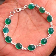 "925 Sterling Silver, Green Onyx Bracelet, Handmade Bracelet, Onyx Jewelry, Mom Gift, 8\" Bracelet, Wife Gifts  METAL - 925 STERLING SILVER GEMSTONE - Green Onyx BRACELET SIZE - 7.5\" WEIGHT - 8.6 Grams STONE SIZE - 8 x 8 mm STONE SHAPE - Oval COLOR - Green Silver: Silver has significant health benefits that have been used across cultures for centuries. Silver has a proven track record as a powerful antimicrobial agent fighting infections and aiding in cold and flu prevention, wound healing, and more. Silver also helps with internal heat regulation and circulation. Occasion:   Birthday gift, Valentine's Day Gift, Anniversary Gift, Wedding Gift, Engagement Gift, Christmas Gift, Gift For Her, Gift For mom, graduation gift, New Year Gift, Thanksgiving Gift, Housewarming Gift" Green Stone Bracelet, Designer Bracelet, Bracelets Design, Hippie Bracelets, Floral Bracelet, Onyx Jewelry, Sterling Silver Jewelry Handmade, Women Bracelet, Onyx Bracelet