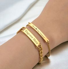 This listing is for two beautiful bracelets: one delicate and slender bracelet, and the other bold and wide. Both bracelets are meticulously crafted from high-quality stainless steel with a stunning gold plating. They are thoughtfully designed to be adjustable, ensuring the perfect fit for any wrist size. These bracelets make an ideal gift for couples, whether it's to celebrate an anniversary or to express love on Valentine's Day. Don't miss out on this exquisite and meaningful present that will Valentine's Day Dainty Bangle Bracelets, Elegant Metal Name Bracelet For Mother's Day, Minimalist Bangle Jewelry For Valentine's Day, Minimalist Metal Bracelets For Mother's Day, Personalized Metal Bracelets For Mother's Day, Gold Stainless Steel Bracelets For Valentine's Day, Gold Minimalist Cuff Bracelet For Friendship, Minimalist Stainless Steel Bracelets For Mother's Day, Elegant Stainless Steel Bracelets For Mother's Day