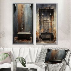 two paintings on the wall of a living room