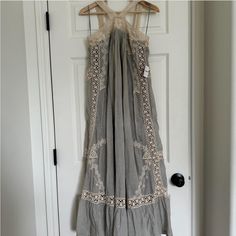 Free People Maxi Dress With Lace, Crochet, And Embroidered Details That Can Be Much More Appreciated In Person For Reference, I Am 5’3 And This Dress Falls About Half An Inch From The Floor When Worn. This Dress Is Super Flowy And Has A Very Loose Fit All Throughout, So It Will Fit Anywhere From An Xs To A S, Maybe Even A M On Petite Sizes. This Dress Is Also Lined From The Top To About 3/4 Way Down The Skirt. Brand New And Never Worn, With Tags. Beige Maxi Dress With Lace Patchwork, Cotton Lace Patchwork Dress For Vacation, Beige Bohemian Midi Dress With Lace Trim, Bohemian Dresses With Lace Patchwork For Daywear, Beige Maxi Dress With Lace Trim For Brunch, Cream Lace Trim Sundress Maxi Dress, Bohemian Midi Dress With Lace Patchwork, Bohemian Beige Lace Midi Dress, Free People Maxi