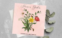 a greeting card with flowers and leaves on it