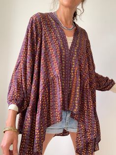 "Super comfy loose and wide silky topper with wide puff sleeve and irregular cut with frills Perfect daily cover up for all year round  MEASURE Size M Shoulder 16\" Bust 46\" Length 26\" MATERIAL * poliester and silk  * no lining  For more boho style ideas please visit also  https://www.etsy.com/uk/shop/Gyaki Thank you for looking" Bohemian V-neck Tops For Layering, Oversized Summer Blouse For Layering, Summer Kimono For Layering, Long Sleeve Summer Kimono For Layering, Summer Layering Long Sleeve Kimono, Flowy Blouse For Layering, Summer Long Sleeve Kimono For Layering, Flowy Blouse For Fall Layering, Flowy Blouse For Layering In Fall