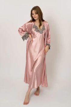 Lightweight and breathable, these soft satin nightgowns make the perfect loungewear for women who love to sleep in style. They're ideal for those who enjoy a more feminine sleepwear look and feel. Oblique V-Neck Long Robe with Lace 3/4 sleeve Fabric strings on the inside to hold the robe together and a removable belt t Feminine Sleepwear, Satin Sleepwear, Straight Clothes, Bandage Midi Dress, Silk Lingerie, Pink Fits, Half Skirt, Women's Nightgowns, Midi Length Skirts