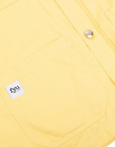 Yellow twill overshirt Style painter Lightweight Brisbane Moss cotton twill Engraved hand-brushed brass buttons Made in France 100 % cottonAlex wears: Size XLAlex's height: 189cm/6'2"Flora wears: Size SFlora's height: 168cm/5'5" Fall Cotton Shirt With Snap Buttons, Cotton Shirt With Snap Buttons For Fall, Summer Cotton Outerwear With Buttons, Unstructured Cotton Outerwear For Summer, Cotton Shirt With Buttoned Pockets, Spring Cotton Shirt With Patch Pockets, Cotton Shirt With Snap Buttons And Relaxed Fit, Yellow Cotton Shirt With Buttons, Yellow Relaxed Fit Shirt With Pockets