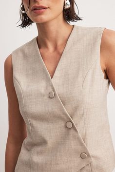 Asymmetric Buttoned Vest Beige | NA-KD Low Waist Jeans, Summer Wedding Dress, Outerwear Vest, Sleepwear Sets, Wedding Guest Dress Summer, Asymmetrical Design, A Button, V Neckline, Linen Clothes