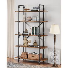 a bookshelf with several shelves and lamps on top of it in a living room