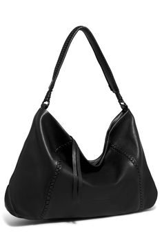 Woven accents give a vintage-inspired look to this slouchy hobo bag designed with a spacious interior and single shoulder straps. 19"W x 11"H x 3.5"D Lined Leather Imported All For Love, Slouchy Hobo Bag, Sporty Sunglasses, Hobo Tote Bag, Nordstrom Women, Black Shoulder Bag, New Balance Shoes, Leather Hobo, Leather Care