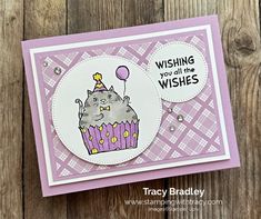 a birthday card with a cupcake on it and a cat wearing a party hat