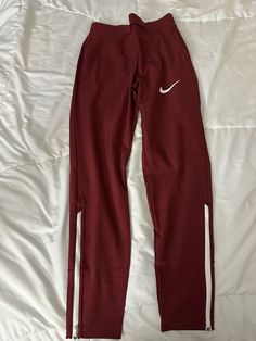 Nike track and field pants Field Pants, Nike Track And Field, Track Field, Running Pants, Active Wear Pants, Red Burgundy, Nike Pros, Track And Field, Burgundy Red