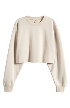 You'll want to lounge all day in this supersoft fleece pullover in a relaxed silhouette with a raw, cropped hem from Kim Kardashian's SKIMS. Crewneck Dropped shoulders Ribbed cuffs 70% cotton, 30% polyester Machine wash, tumble dry Imported Basic Crewneck, Crop Pullover, Crop Top Casual, Harajuku Streetwear, Oversize Women, Sweatshirt Women, Cropped Sweatshirt, Cropped Tops, Crop Sweater