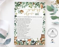 a forest baby shower game with animals and leaves on the side, surrounded by greenery