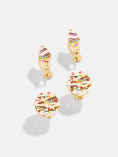 Satisfy your little one's cravings with the Sweet Tooth Kids' Clip-On Earring Set. This set includes a pair of colorful donut and ice cream clip-ons that are lightweight and easy to wear. So cute and playful, they are the perfect way to show off your love for all things yummy. Please note: intended for children 3+ Clip On Earrings For Kids, Savannah Shopping, Donut And Ice Cream, Cream Clip, Colorful Donuts, Kids Earrings, Childrens Jewelry, All Kids, Ice Cream Cone