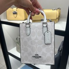 Nwt Coach Mini Tote In White With Strap White Rectangular Light Luxury Bag, White Light Luxury Bag For Everyday Use, High-end White Rectangular Bag, Light Luxury White Shoulder Bag For Everyday, White Light Luxury Shoulder Bag For Everyday, Luxury White Square Bag, Luxury White Square Bags, High-end White Double Handle Bag, High-end White Square Shoulder Bag