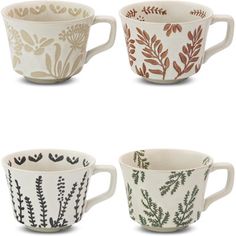 four coffee cups with different designs on them