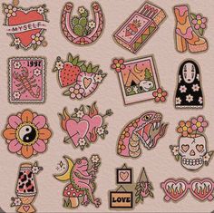 some stickers that are on the side of a pink wall with flowers and hearts