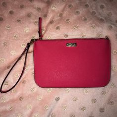 Nwot Kate Spade Wristlet. This Hot Pink Is A Great Pop Of Color For Any Outfit. Would Fit Any Size Iphone Inside And Have Card Slots For Convenience! Pink Pouch Clutch For Mobile Phone, Pink Mobile Phone Pouch Clutch, Pink Wallet Pouch With Cell Phone Pocket, Pink Wallet With Cell Phone Pocket In Pouch Shape, Pink Wallet With Cell Phone Pocket, Pink Pouch Clutch With Wrist Strap, Pink Clutch Wallet With Wrist Strap, Pink Clutch With Wrist Strap, Pink Pouch Wallet With Wrist Strap