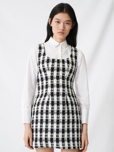 Short length tweed sleeveless tunic dress with patterned material. Wide scooped neckline and zipper at back. Model is in MINUSEY S. * MINUSEY S = EU 34, US 2* MINUSEY M = EU 38, US 6* 100% Polyester* Dry clean* Made in Korea - Model Height: 170cm/5'7" (US2, EU34) Maje Dress, Tweed Set, Mini Dresses Online, Mini Robes, Black White Dress, Tweed Dress, Sleeveless Tunic, Overall Dress, Sleeveless Mini Dress