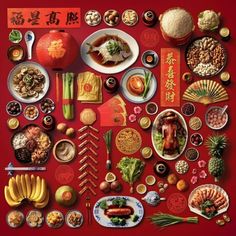 a red table topped with lots of food