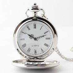 Keep track of every minute of your time with this Silver Pocket Watch. It has an exquisite silver case with a Roman numeral hour marker and pushed button located at the top, making it easier to read and adjust the time. Definitely the perfect gift for both men and women. Removable chain Silver-tone Alloy material Silver Pocket Watch Metal Dial Gift, Silver Pocket Watch With Metal Dial As Gift, Silver Pocket Watch With Metal Dial For Gift, Silver Watches With Compass Design And Round Dial, Silver Stainless Steel Pocket Watch As Gift, Classic Watch Accessories With Stopwatch For Gifts, Silver Stainless Steel Pocket Watch, Classic Silver Stainless Steel Pocket Watch, Timeless Silver Stainless Steel Pocket Watch