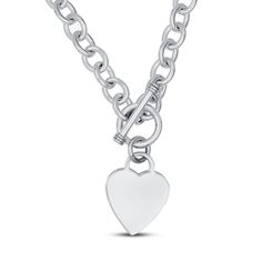 A delicate engravable heart medallion rests gently at the bottom of this dynamic women's necklace. Fashioned in lustrous sterling silver, the 16-inch chain secures in place with a toggle clasp. Jared Jewlery, Silver Heart Chain Necklace, Heart Pendant Necklace Silver, Heart Chain Necklace, Pandora Heart, Women's Necklace, Jared The Galleria Of Jewelry, Toggle Necklace, Heart Chain