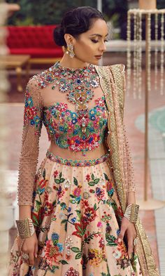 Buy Multi-color Embellished Ivory Lehenga Choli Bridal in premium quality fabric detailing paired with an embellished dupatta. Customizable. Fast Shipping Ivory Lehenga, Baju Kahwin, Sangeet Outfit, Heavy Dresses, Lehenga Blouse Designs, Red Lehenga, Indian Bridal Dress, Bridal Lehenga Choli, Indian Wedding Outfits