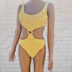 Nwt Gorgeous Yellow Monokini Perfect For The Pool Or Vacation!! Monokini Pulled Together By Plastic White Ring In The Center. Cutout Swimwear For Summer Beach Party, Cutout Swimwear For Beach Party In Summer, Summer Beach Party Cutout Swimwear, Cutout One-piece Bodysuit For Beachwear, Summer Party Swimwear With Cutout, Summer Cutout Swimwear For The Beach, Beach Party Cutout Sleeveless Swimwear, Sleeveless Cutout Swimwear For Beach Party, Summer Beach Bodysuit With Cutout