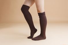 "Product Details: * Material: Cotton * Features: Sweat absorption, anti-proof * Size: Average (approximately 52 cm long) * Origin: Made in South Korea Description: Prepare for a cozy and warm autumn and winter with our thick wool circle over-the-knee socks, proudly made in South Korea. These socks offer exceptional warmth and protect your knees and thighs. With soft and delicate interior fibers that lock in the temperature, you'll stay comfortable all season long. To ensure the longevity and per Brown Knee-high Socks For Winter, Warm Brown Socks For Fall, Brown Stretch Socks For Winter, Brown Socks For Fall Stocking Stuffer, Thick Knee-high Winter Socks, Warm Thigh High Socks For Fall, Brown Knee-high Winter Socks, Brown Knee-high Leg Warmers For Winter, Brown Knee-high Winter Leg Warmers