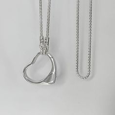 "Open Heart Front Clasp Necklace Heart Clasp Wedding Ring Clip Details: Chain: Solid Sterling Silver Rounded Box Chain 1.8mm width Clasp: Solid Sterling Silver Large open heart clasp or ring clip, 23mm  Lengths:  16\" to 36\" Choose your length in the drop down menu Shipping: Free shipping in the USA Ready to ship within one business day Comes wrapped as shown in photos ready for gift giving Click on the link below for all items in my shop: lagunalifedesigns.etsy.com" White Gold Heart Pendant Jewelry With Box Chain, White Gold Open Heart Promise Jewelry, Wedding Sterling Silver Heart Necklace With Adjustable Chain, Wedding White Gold Heart Necklace With Polished Finish, Polished Open Heart Necklace For Wedding, Wedding Open Heart Polished Necklace, Wedding Ring Holder, Ring Clip, Sterling Silver Heart Necklace