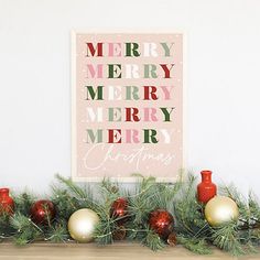 a christmas card on a mantle with ornaments