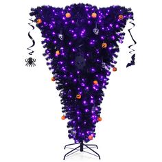 a purple and black halloween tree with decorations