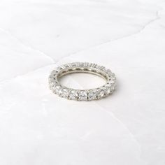 Beautiful eternity style diamond band featuring 3mm stone diamonds. It is elegant and chic and great for stacking or as a wedding band! Made of 925 Sterling Silver We use a THICK, DURABLE plating of 14K Gold, Rose Gold or Rhodium - for a piece that will last you years to come! Highest grade CZ for an authentic diamond look! Nickel-free & Hypoallergenic Thickness: 3mm Ring Sizer Ring Sizer, Recycled Metal, Diamond Band, Ring Size Guide, Eternity Band, Eternity Bands, Diamond Bands, Gold Rose, Precious Metals