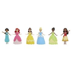 the disney princess dolls are lined up in different colors and sizes, with their arms spread out