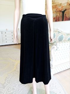 "black velvet skirt Witch skirt Long black skirt womens skirt Edwardian skirt Victorian skirt Long skirt retro skirt S goth skirt Made in England height of the woman in the photo - 180 cm Please refer to photos for details of condition. Condition: very good vintage Measurements: Length: 75 cm/29.5 \" Waist 70 cm/27.6\" Hips: 100 cm/39.4\" Size US 10 UK 12 note The color on the pictures may vary due to monitor settings and light reflections. Ready to ship Please do not hesitate to contact with me Black Velvet Gothic Bottoms, Black Gothic Velvet Bottoms, Gothic Evening Skirt, Elegant Black Velvet Bottoms, Vintage Black Skirted Bottoms, Vintage Black Lined Skirt, Vintage High Waist Black Skirt, Vintage Black Flared Skirt, Black Vintage Pleated Skirt