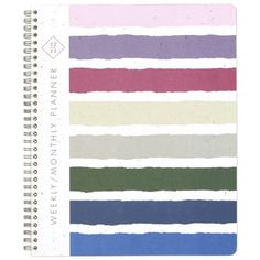 a spiral notebook with different colored stripes on it