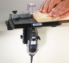 Convert your corded rotary tool into a light-duty, bench-mounted precision wood shaper with the Dremel 231 Shaper/Router Table. The 231 attachment easily mounts to any tabletop workspace, and is compact and easy-to-store when not in use. The Shaper/Router Table acts as a small router table making it easy to slot, edge, groove and/or sand items in both conventional and irregular shapes. Featuring simple-to-grip plastic knobs that include a screwdriver slot for easier tool assembly and a depth adj Dremel Router Bits, Dremel Tool Accessories, Milling Table, Dremel Router, Small Router, Dremel Tool Projects, Dremel Crafts, Woodworking Equipment, Dremel Projects