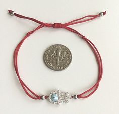 925 sterling silver hamsa evil eye red bracelet .adjustable .for protection ,good luck and prosperty. --comes with free gift pouche. pulsera rojo de plata esterlina 925 mano de fatima ojo de la buena suerte. ajustable. para proteccion ,buena suerte y prosperidad. --gratis bolsa de regalo. Nickel-free Red Sterling Silver Bracelet, Adjustable Evil Eye Spiritual Jewelry, Adjustable Spiritual Evil Eye Jewelry, Adjustable Evil Eye Jewelry Bracelet, Adjustable Silver Round Evil Eye Bracelet, Adjustable Evil Eye Jewelry Gift, Adjustable Symbolic Evil Eye Jewelry, Adjustable Evil Eye Jewelry For Gift, Spiritual Evil Eye Bracelet With Adjustable Length