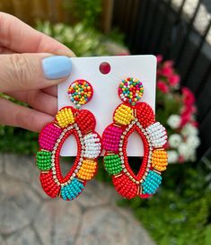 These multicoloured seed bead drop earrings have the perfect summer vibe and are the perfect accessory to add a burst of colour to your outfit.  Perfect for everyday outfits and perfect for those bright vacation outfits you have been planning. each earring weighs 6 grams Elegant, fun and fashionable hair accessories and more, shop now and own a unique statement piece that will turn heads and have everyone asking "where did you get that". Be sure to check out some of our other fun summer earrings Bead Drop Earrings, Crystal Bead Jewelry, Unique Gifts For Mom, Summer Earrings, Earrings Diy, Round Light, Beaded Drop Earrings, Summer Earring, Colorful Earrings