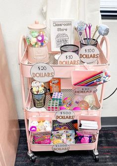 a pink cart filled with lots of items