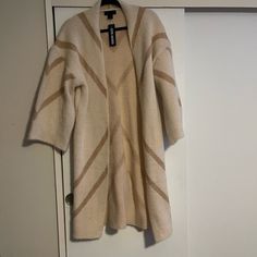 Long Cardigan Trendy Neutral Cardigan For Fall, Cream Open Front Cardigan For Fall, Cream Open Front Sweater Coat For Fall, Cream Open Front Sweater Coat For Spring, Trendy Neutral Fall Cardigan, Trendy Open Front Beige Sweater, Neutral Open Front Cardigan For Fall, Cozy Beige Sweater Coat For Spring, Cozy Beige V-neck Outerwear