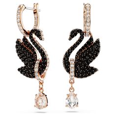 These light-catching earrings are a beautiful expression of the signature Swarovski emblem. Connected to mini hoops, each rose gold-tone plated piece features an elegant swan motif, expertly decorated with a pavé of jet black Swarovski ReCreated™ crystals. A clear, pear-cut Swarovski Zirconia delicately hangs beneath from a rose gold-tone link. Wear these earrings to elevate your own style, or present them as a radiant gift to a loved one. Baking Conversions, G Unit, Flowers For Men, Swarovski Swan, Outfit Pieces, God Jul, Gold Plated Bracelets, Swarovski Earrings, Swarovski Jewelry