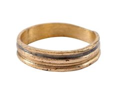 a gold and black band ring with two bands on the inside, in front of a white background